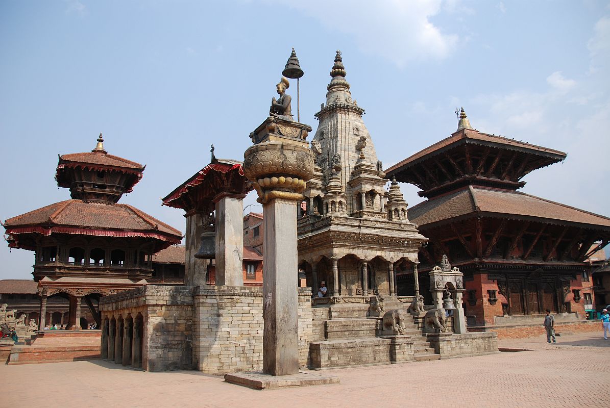 Kathmandu Bhaktapur 02-1 Bhaktapur Durbar Square Teleju Bell, King Bhupatindra Malla Column, And Vatsala Durga Temple In front of the Royal Palace in Bhaktapurs Durbar Square are the large Teleju Bell (1737), King Bhupatindra Mallas column (1699), and the shikhara-style stone Vatsala Durga Temple (1672). Much of Bernardo Bertoluccis movie Little Buddha was filmed near the Vatsala Temple. On the left is Chyasilin Mandapam, an octagonal temple rebuilt in 1990 after it was destroyed by fire in 1934.